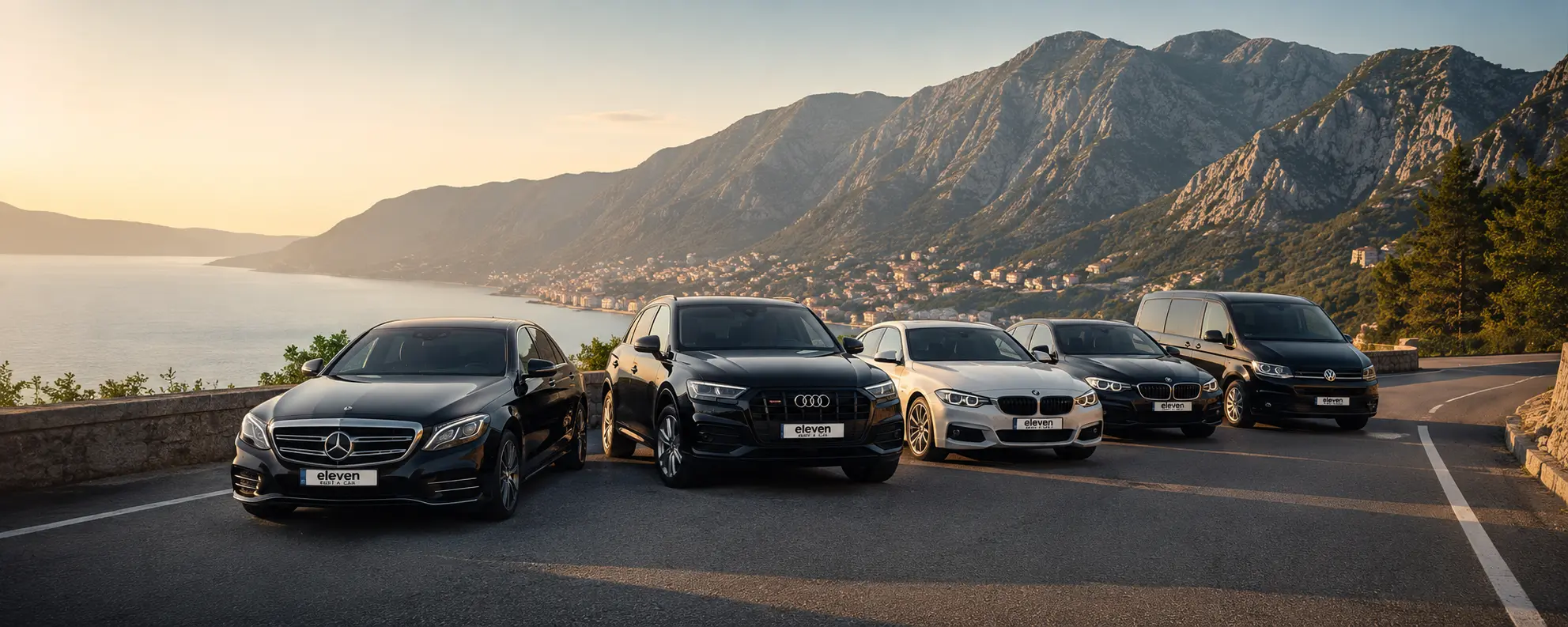 The Eleven Rent A Car fleet parked above the Bay of Kotor, Montenegro